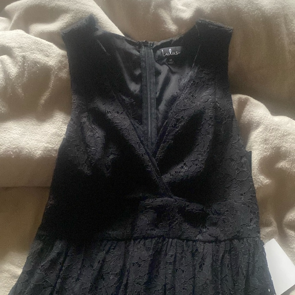 Black mid length v neck crochet dress